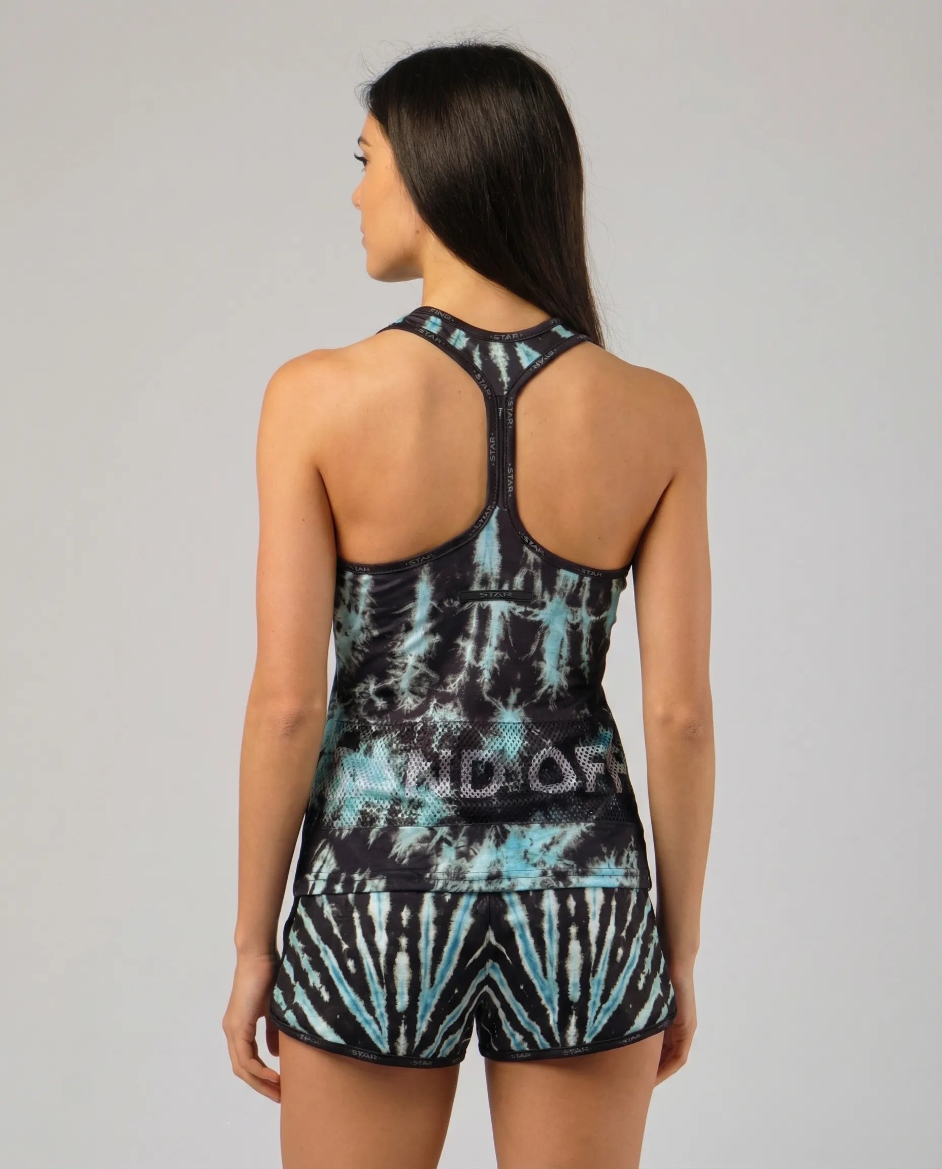 Back view of Cosmic Reef women's tank top featuring the patented Sand Off system for quick hand cleaning.