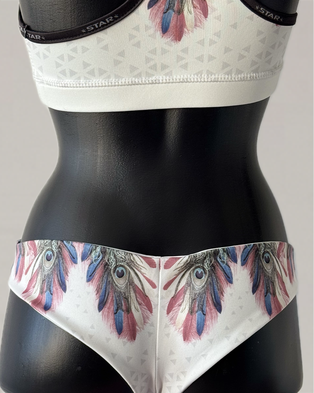 SunSpike Mid-Coverage Slip – Peacock