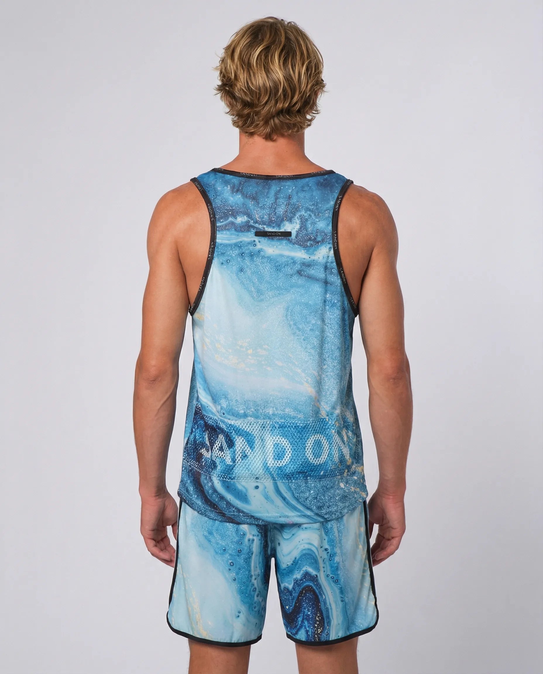 STAR Supernova performance tank top with Sand-Off technology, vibrant graphic anti-sand regular fit gear for beach volleyball.