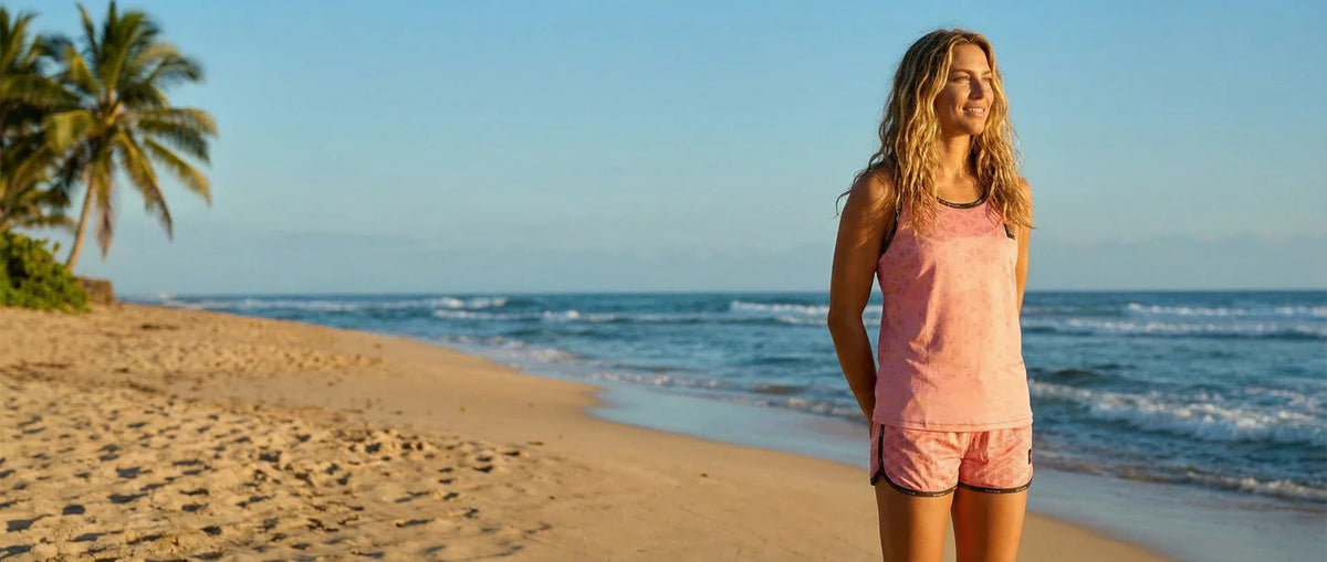 STAR Beachwear athlete training on the sand with sustainable performance gear.
