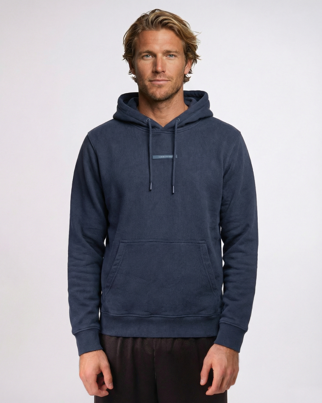 beach volleybal player  wearing a black hoodie on a white background