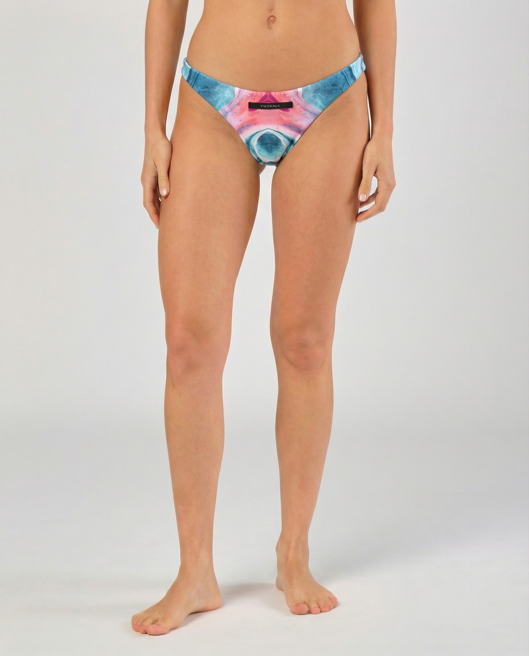 STAR Astral Flow Sunspike Bikini Bottom – front view, minimalist beach volleyball briefs with athletic low-rise fit
